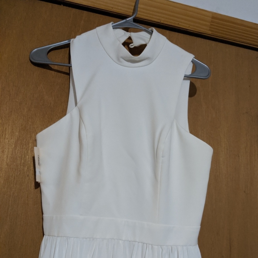 White Fame and Partners gown